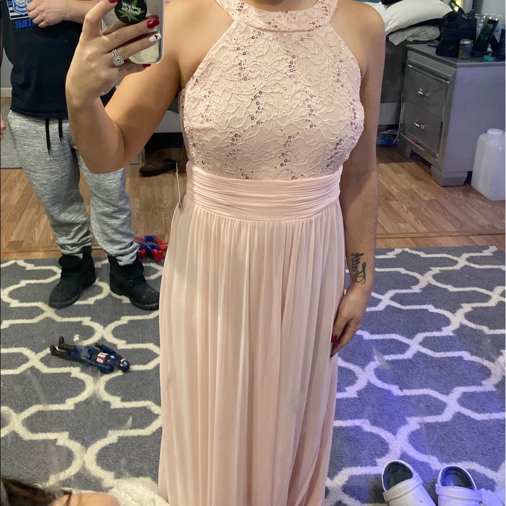 David’s bridal only worn to try on, size 0 still has tags,color is pedal pink